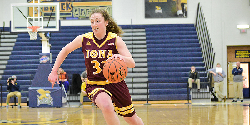 Tori Lesko playing for Iona dribbling down court.