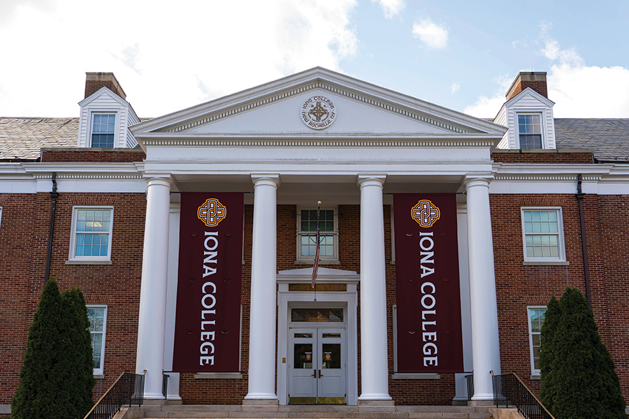 The main entrance of McSpedon Hall with the new Iona banners.