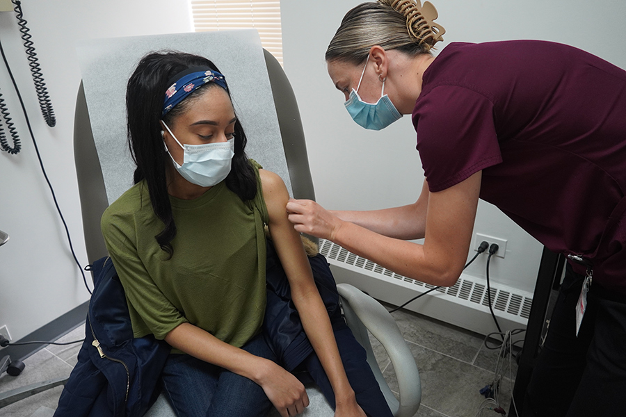 Iona College nursing students administer the COVID-19 vaccine.