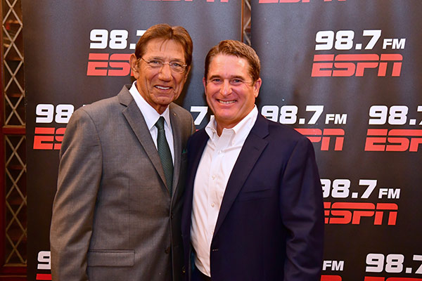 Tim McCarthy in front of an ESPN backdrop.