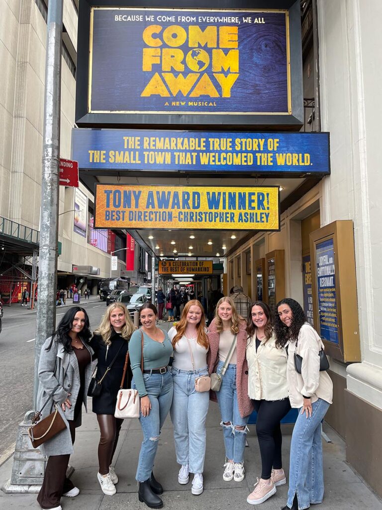 Students outside of the Come From Away broadway play.