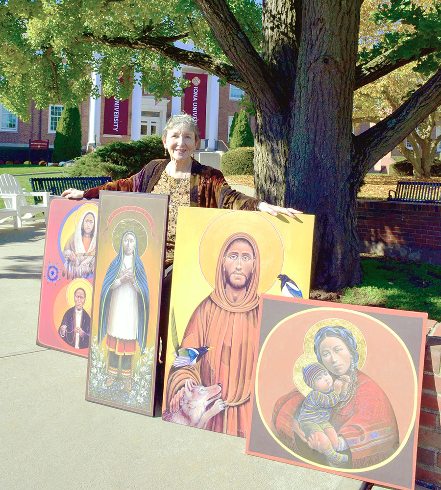 Dr. Kathleen Deignan, CND, sits with sacred icons beneath the Gingko tree.  