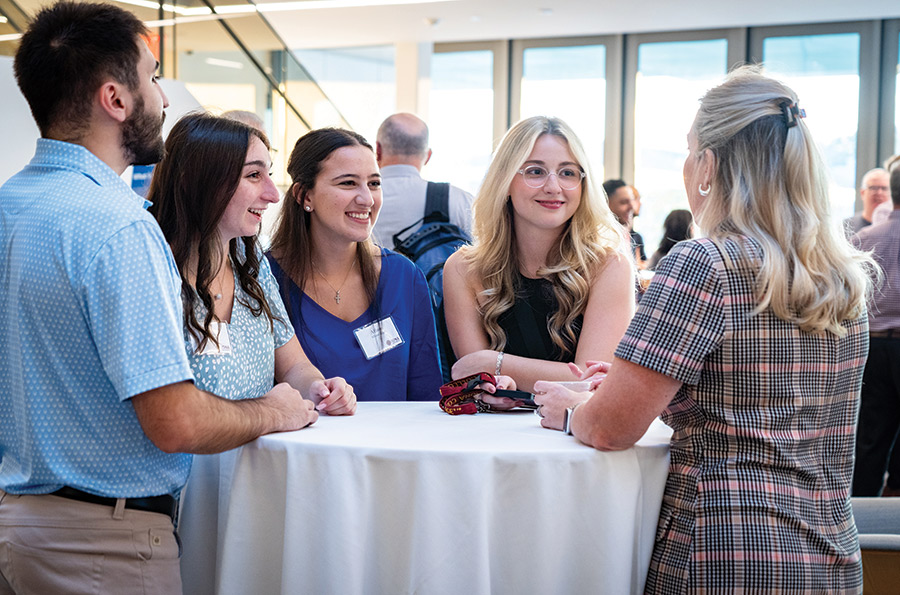Mentees chat at a Gaels Go Further event.