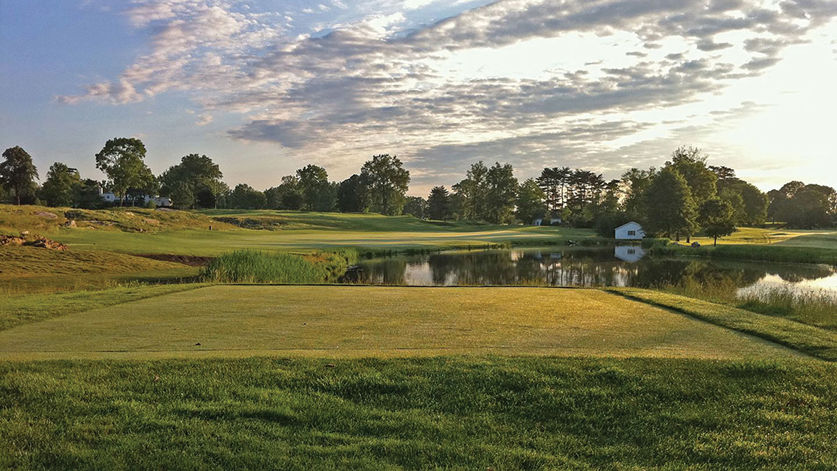 Sunrise over a golf course.