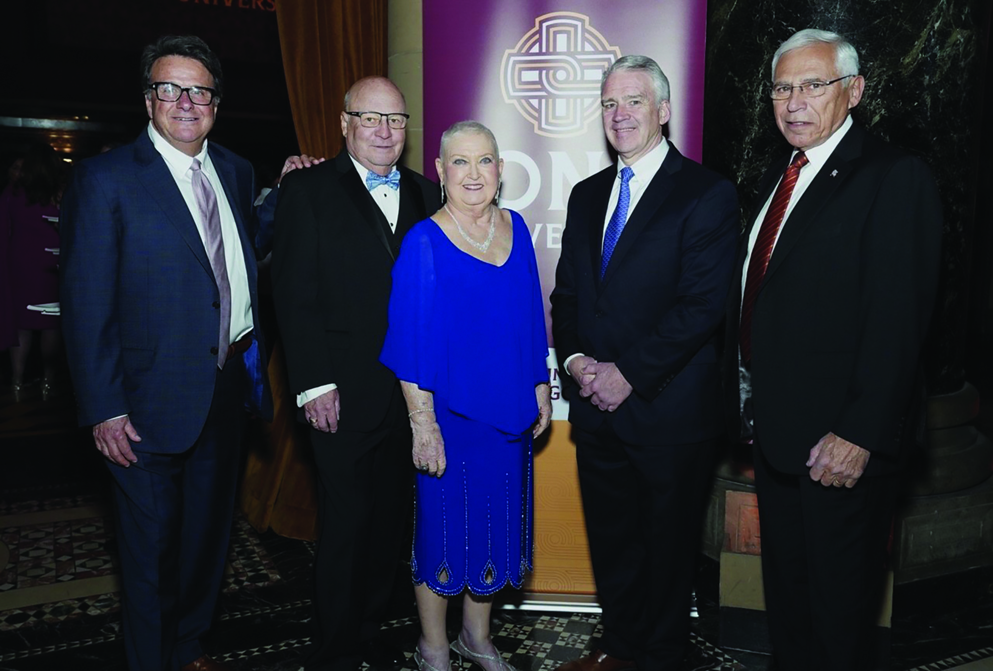 Left to Right: Edward R. McNally Jr. ’78, John C. ’71 Judge, Monica L. Judge ’70, Iona University President Seamus Carey, and Robert J. DeLuccia ’67, ’79MBA