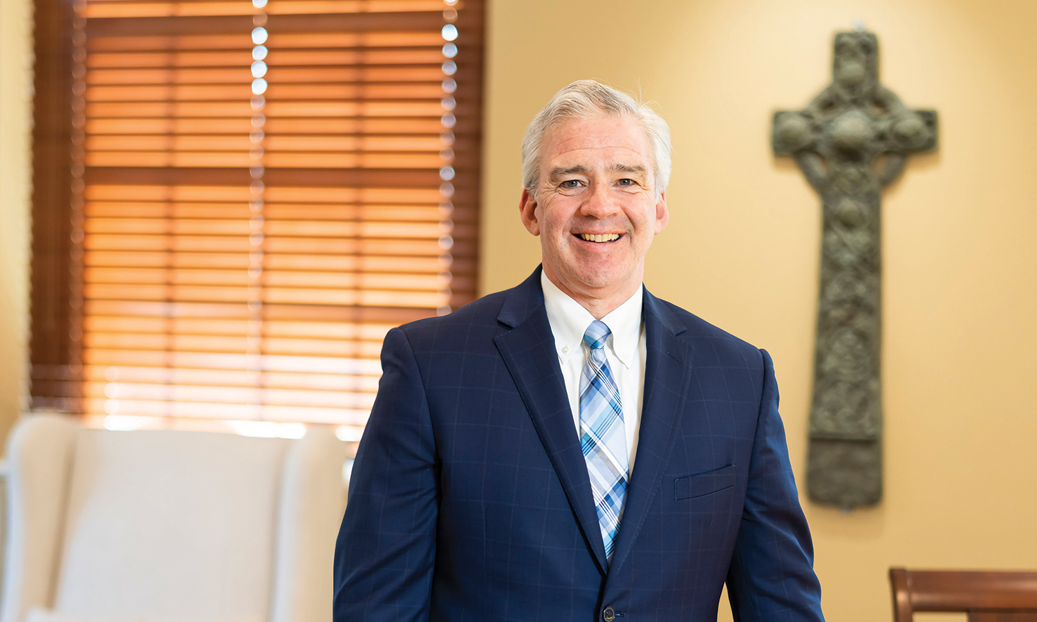 President Carey in his office.